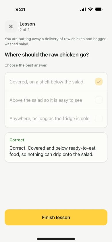 A short food hygiene practice question on a phone, with an explanation after the learner chooses an answer.
